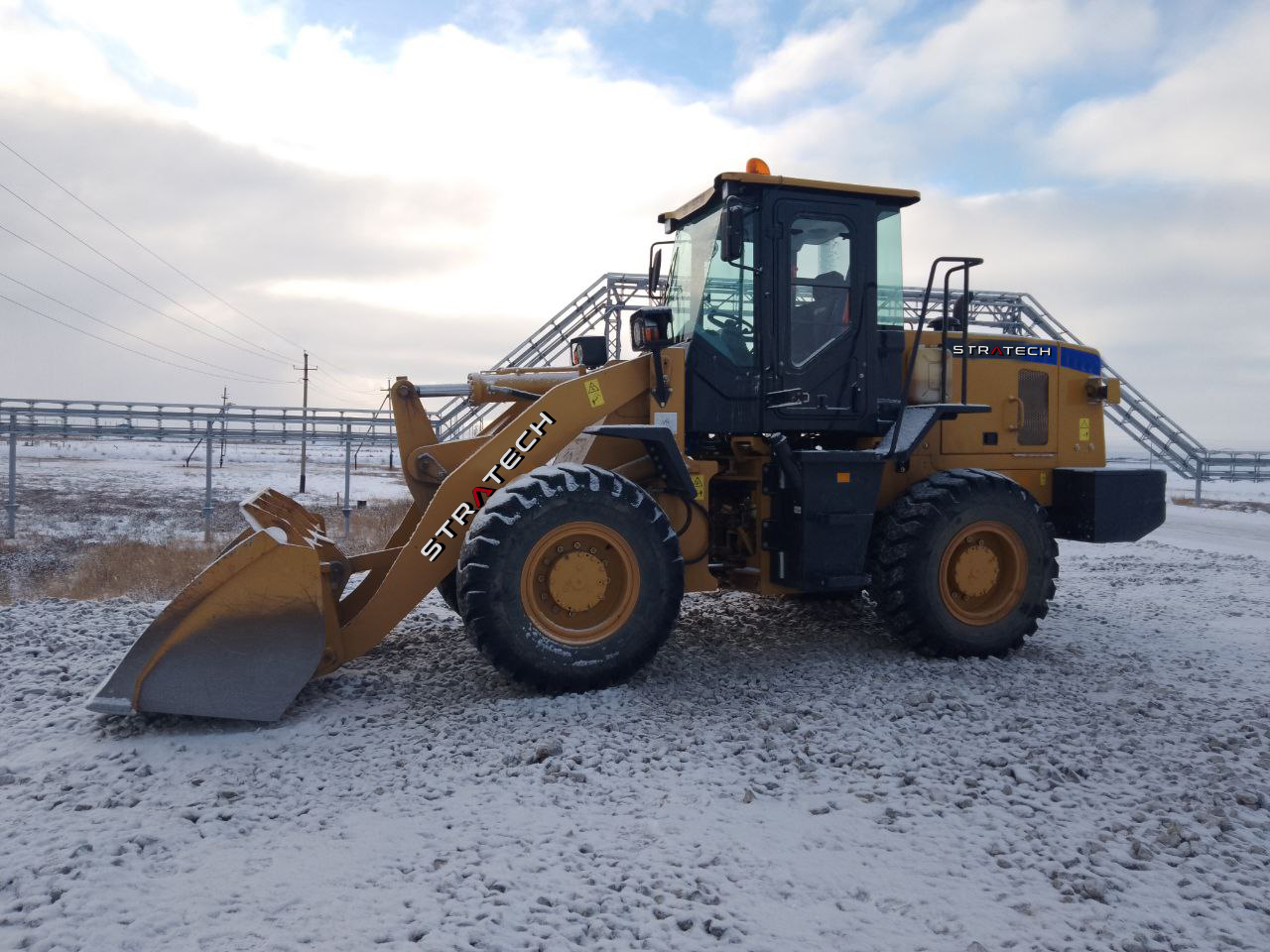 Что такое фронтальный погрузчик в Нижневартовске